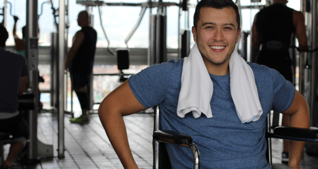 A person smiling at disability gym in Alice Springs.